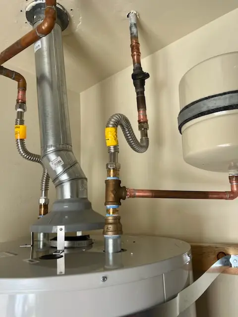 Water heater installation and plumbing repair in Liberty Gardens